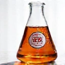 Icon for no additives, a crossed-out chemical symbol